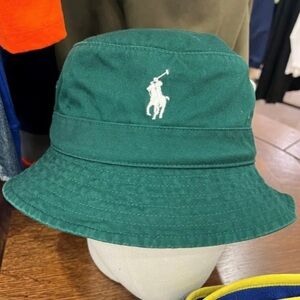 Polo Ralph Lauren Cotton Chino Bucket Hat in Green, available in sizes L and XL.